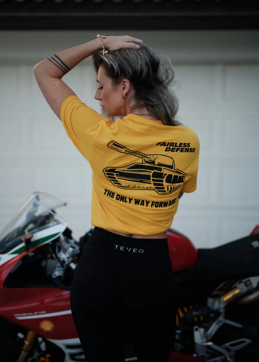 Fairless Defense mustard tee with motorcycle
